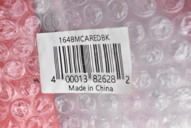 Barcode label on bubble wrap, showing "164BMCAREDBK" and "Made in China." Part of auction item set.