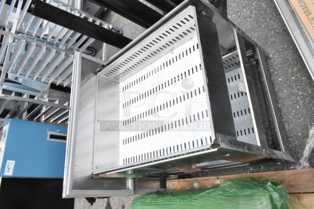 Clark stainless steel drawers, brand new with minor scratches, open view showing perforated interior.