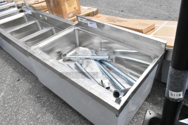 Brand new Regency 600IB2130C0 ice bin with cold plate, bottle holders. Minor dents visible. In original packaging.