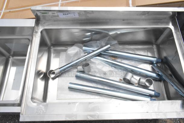 Brand new Regency 21"x30" underbar ice bin with cold plate, bottle holders; scratch and dent condition.