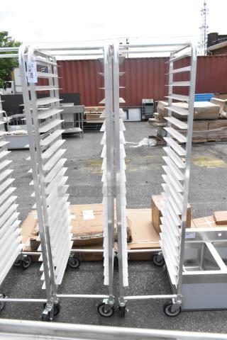 2 brand new Regency 600STPR20KD aluminum steam table pan racks, 20-pan capacity, on commercial casters, scratch and dent condition.