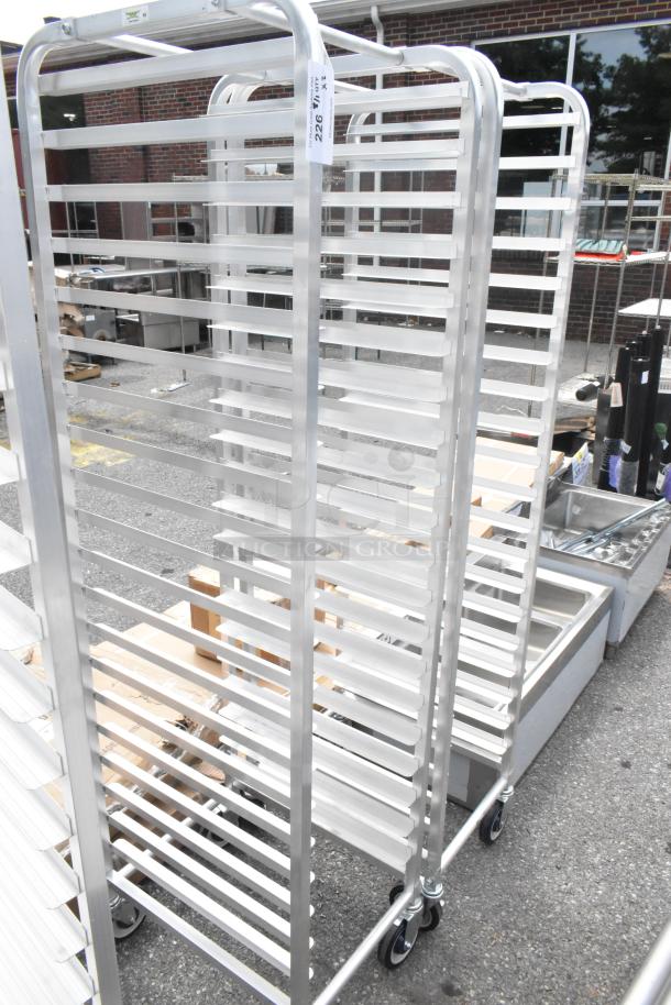 2 new Regency 600STPR20KD aluminum pan racks on commercial casters, scratch and dent, holds 20 pans each.