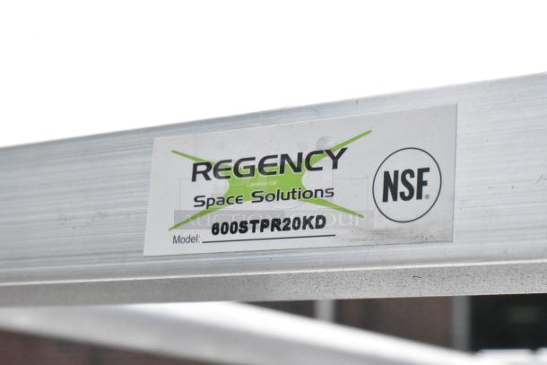 Alt text: Regency 600STPR20KD steam table pan rack label, NSF certified, commercial aluminum, with visible "Scratch and Dent" condition.