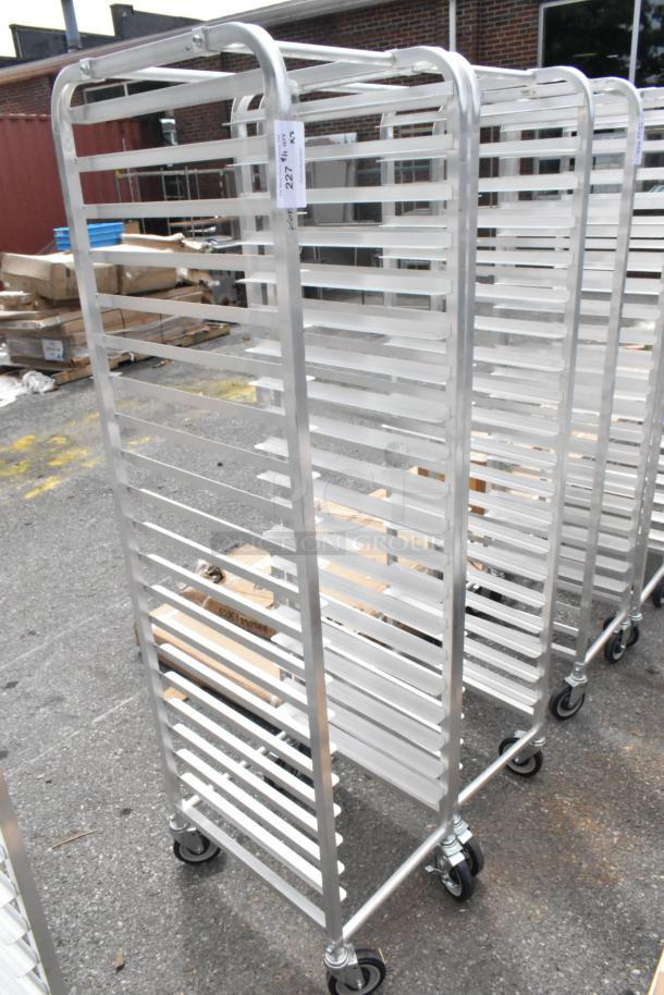 2 new Regency 600STPR20KD 20-pan aluminum steam table pan racks on commercial casters. Slight scratches, no dents.
