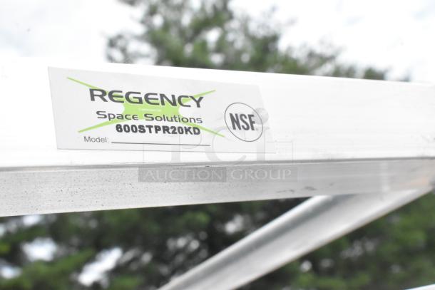 Regency 600STPR20KD aluminum steam table pan rack, NSF certified. New scratch and dent condition with visible logo label.