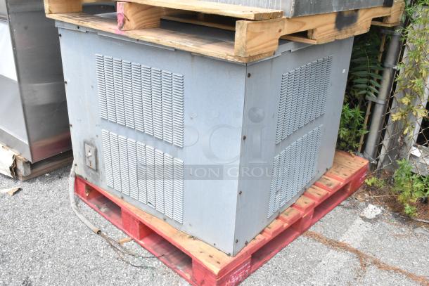 Stainless steel commercial grease hood with mushroom exhaust fan and FloAire SA15 filter. Ventilator visible, good condition.