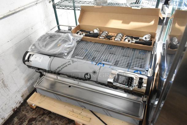 Brand new Nuova Simonelli 238AUWV3 Aurelia Wave espresso machine, scratch and dent, stainless steel, 3 group, 220V, with 4 portafilters and 2 steam wands, countertop model.