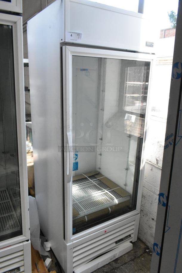 Brand new 2021 True TSCI-600R-G-PH single door reach-in cooler, poly coated racks, 115V, 1 phase, minor scratches and dents.