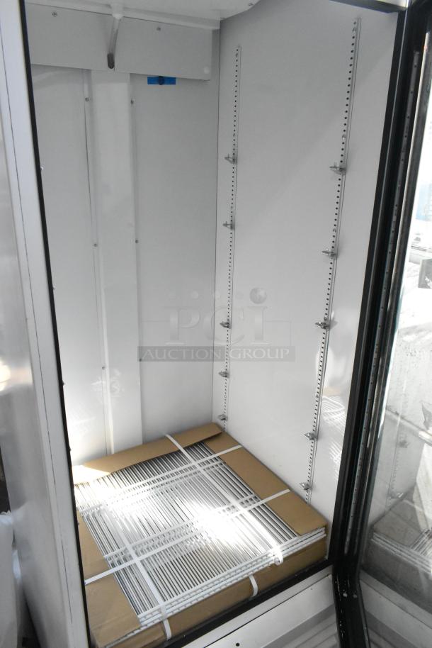 Brand new 2021 True TSCI-600R-G-PH single door cooler merchandiser, 115V, 1 phase, with poly-coated racks, scratch and dent condition.