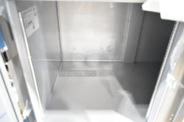 Beverage Air DP93HC stainless steel commercial pizza prep table interior view. Brand new, scratch and dent condition.