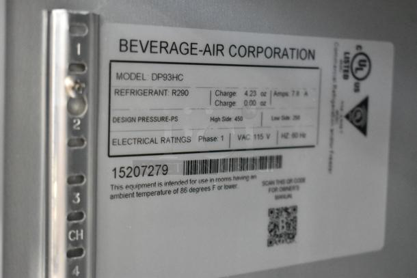 Beverage Air DP93HC stainless steel commercial pizza prep table, 115V 1-phase. Refrigerant R290. Model tag visible.