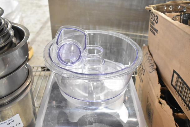 12 brand new scratch and dent items, including stainless steel cylindrical drop-in bins and clear food processor parts.