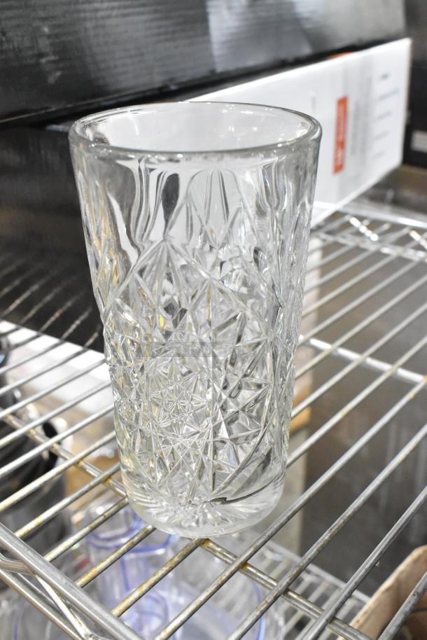 Box of 12 Libbey Hobstar 16 oz. cooler glasses, scratch and dent condition, missing 1 glass, intricate pattern design.
