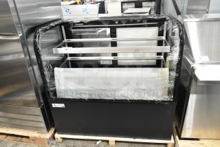Avantco 193BC48HCB 48" refrigerated bakery display case with broken curved glass, black finish, 120V, 1 phase. Brand new.