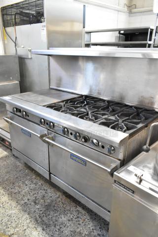 Imperial stainless steel 6-burner gas range with flat top griddle, convection oven, standard oven, overshelf, and backsplash.