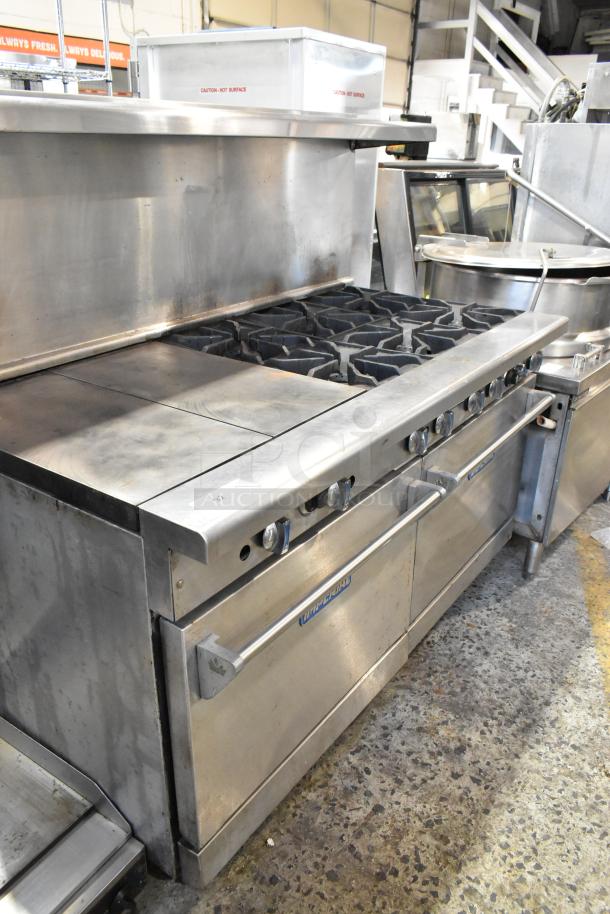 Imperial stainless steel 6-burner range with flat top griddle, convection and standard ovens, over shelf, and backsplash.