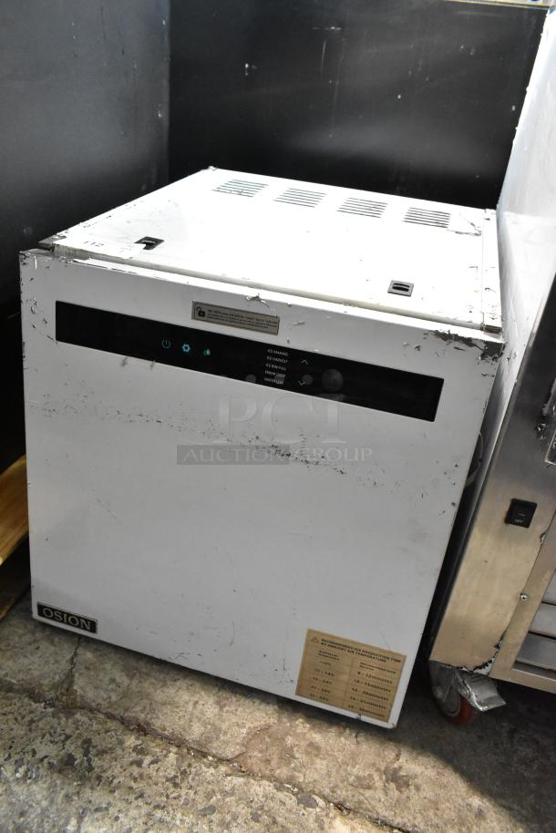 Osion OCM-350 stainless steel commercial ice head, 115V, 1-phase. Visible wear, control panel, and brand logo.