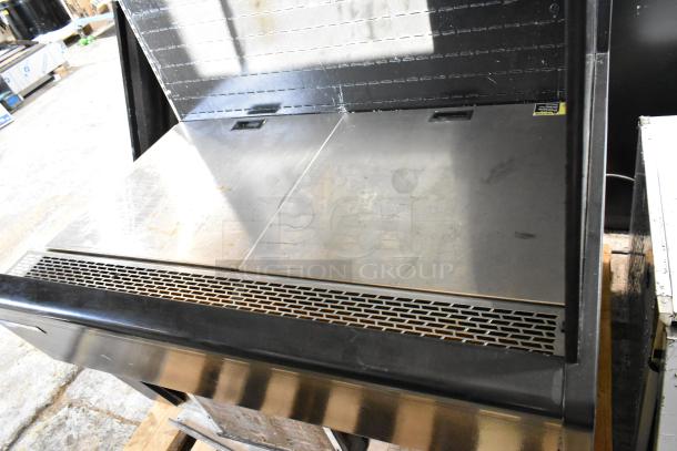 Master-Bilt metal commercial open grab n go merchandiser, missing one side panel, tested and working.