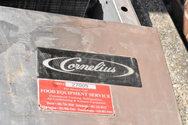 Cornelius CCM0530AH1 commercial ice head, 115V, 1 Phase, visible wear, with Cornelius logo and service call label.