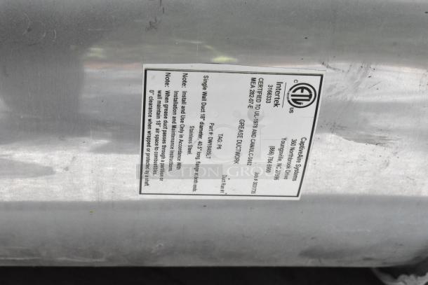 Stainless steel grease hood with mushroom exhaust fan, FloAire SA15 filters, labeled certified grease ductwork.