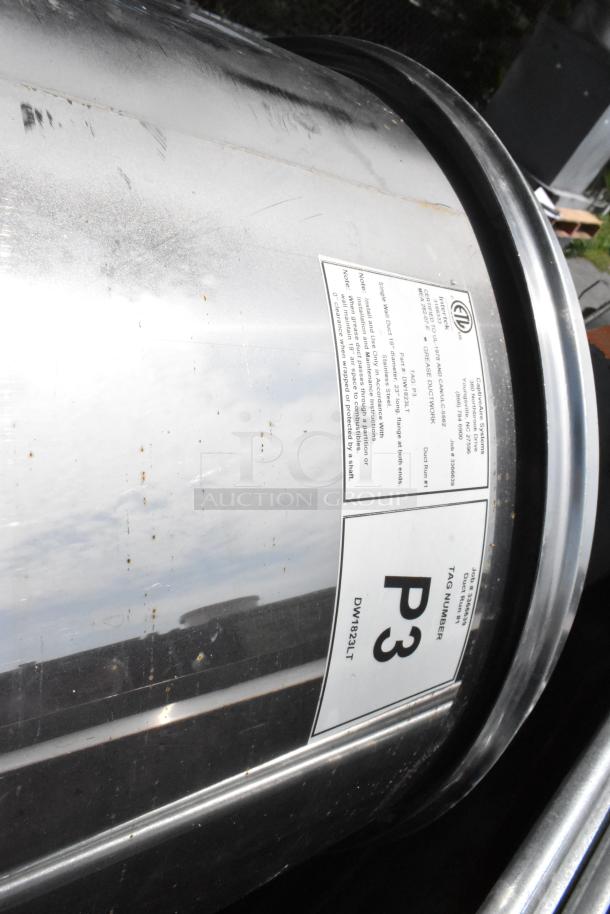 Stainless steel commercial grease hood with mushroom exhaust fan. Features FloAire SA15 filtered makeup air vent. Visible label with tag number P3. Good condition with minor surface wear.