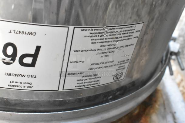Stainless steel commercial grease hood with mushroom exhaust fan. Label shows model DW18417L and job number 3366939.