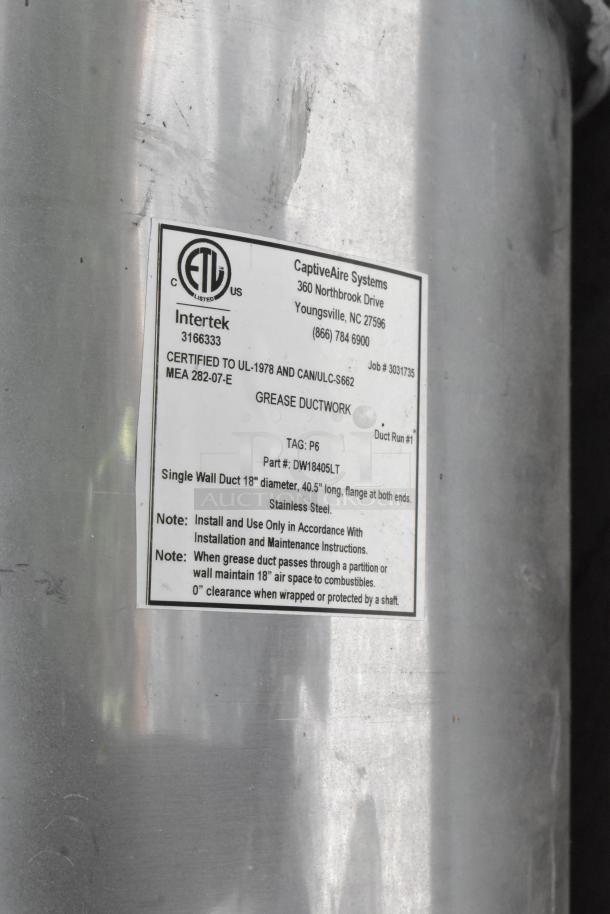 Stainless steel grease hood with mushroom exhaust fan, FloAire SA15 filter, and ETL certified ductwork. Tag details visible.