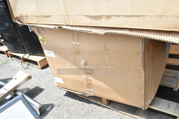 Brand new SKSPK480FM in original packaging with visible box damage, noted as "scratch and dent," on a pallet.