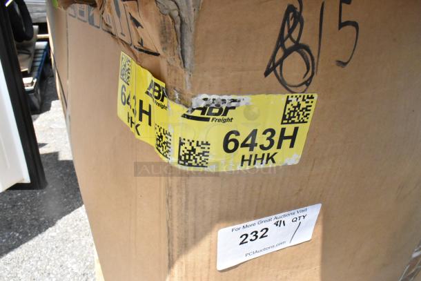 Cardboard box for SKSPK480FM, marked "Brand New Scratch and Dent," showing yellow shipping label with QR code, damaged corner.