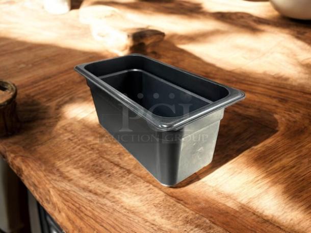 Cambro 36CW110 Camwear® 1/3 size black polycarbonate food pan, 6" deep, excellent condition.