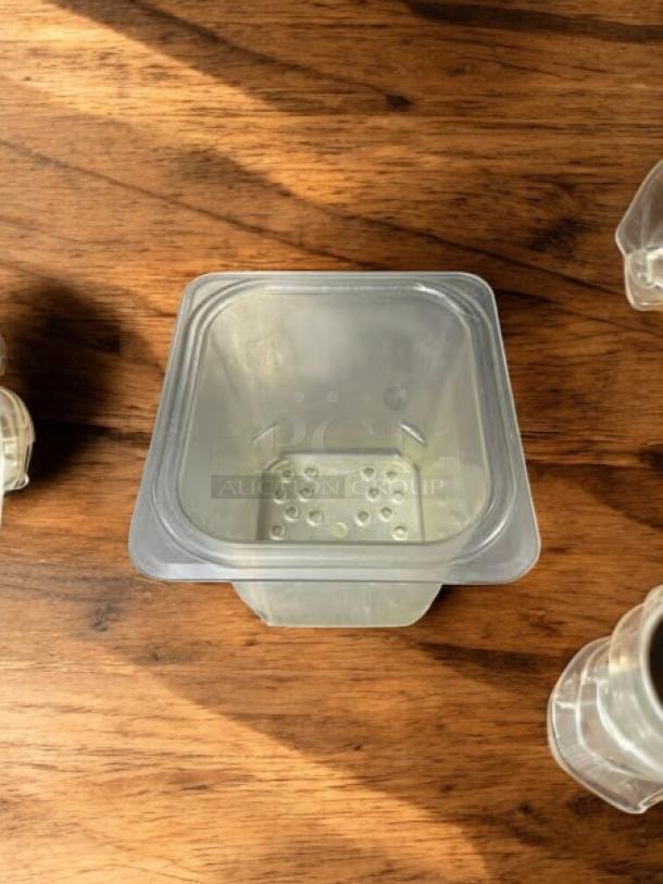 Cambro 65CLRCW135 Camwear® 1/6 Size Clear Polycarbonate Colander Pan, 4" deep, excellent condition, perforated design.