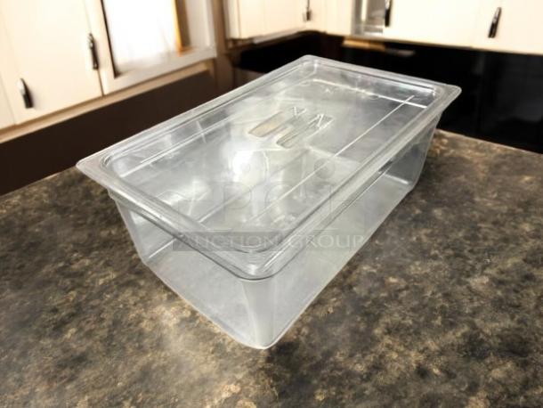 Cambro 16CW135 Camwear® full-size clear polycarbonate food pan, 6" deep, excellent condition, shown on countertop.