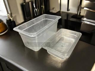 Cambro clear food storage containers, sizes 1/3" and 1/4", in excellent condition, displayed on a kitchen counter.
