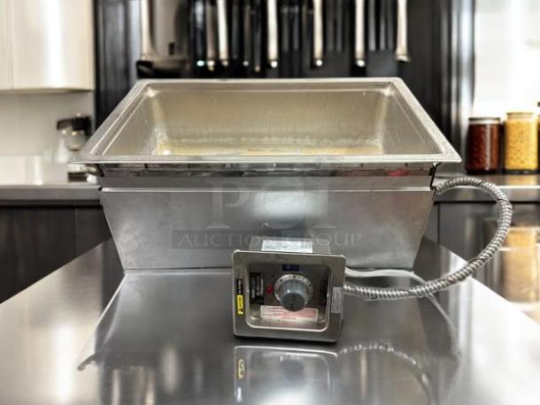 Wells drop-in food warmer, 22"W x 14"D, stainless steel, 115v, with control panel in excellent condition.