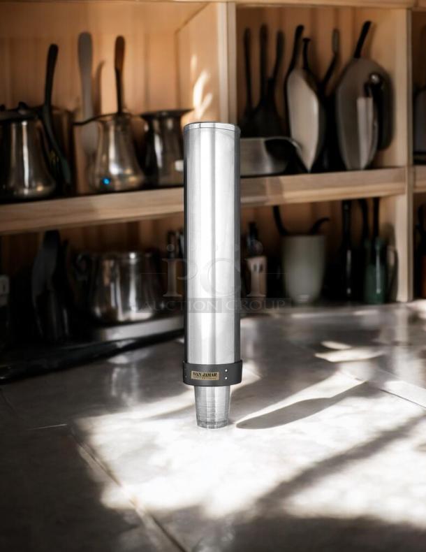 San Jamar C3400P stainless steel wall mount cup dispenser for 12-24 oz. cups; excellent condition, tested, working.