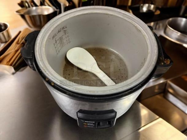 Zojirushi NYC-36 20-cup electric rice cooker, stainless steel, good condition, with inner markings and spatula. Fully tested.