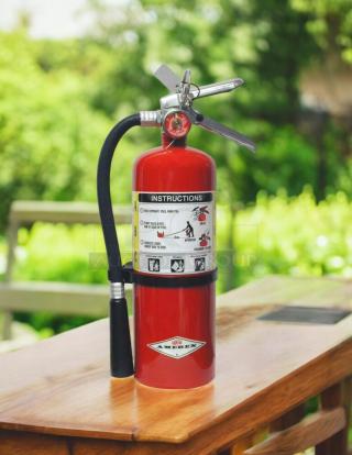 AMEREX Model A500 dry chemical fire extinguisher in excellent condition, with clear label and instructions.