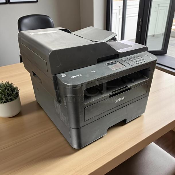 Brother MFC-L2750DW All-in-One Laser Printer in awesome condition, fully tested and working, black finish with visible controls.