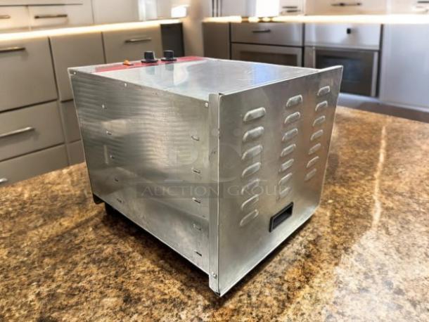 Avantco CFD10 stainless steel food dehydrator, ten trays, removable door, 120V, excellent condition, fully tested.