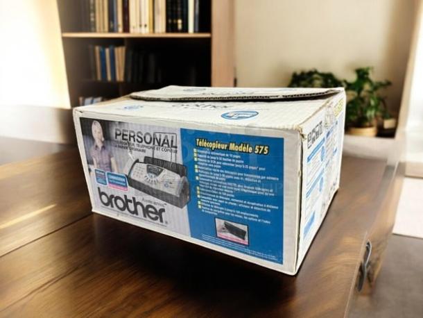 Brother FAX-575 Personal Fax, Phone, and Copier in original packaging, amazing condition, fully tested and working.