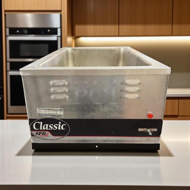 APW W-3V Warmer, excellent condition, fully tested, freestanding, silver finish, visible "Classic" APW branding and label.