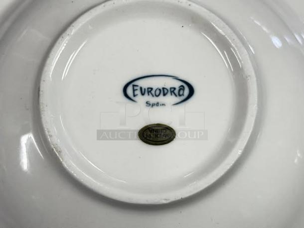 Eurodra Spain 10 1/2” white pasta plate in excellent condition; features Eurodra logo and "Made in China" label on bottom.