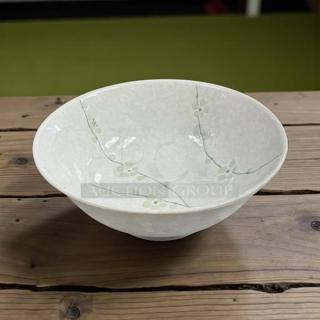 8.5" white ceramic bowl, made in Japan, features delicate floral design. Excellent condition, collectible.