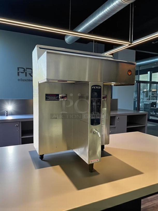 Fetco CBS-2032E twin dual automatic coffee brewer in excellent condition, 240v, fully tested, stainless steel finish.