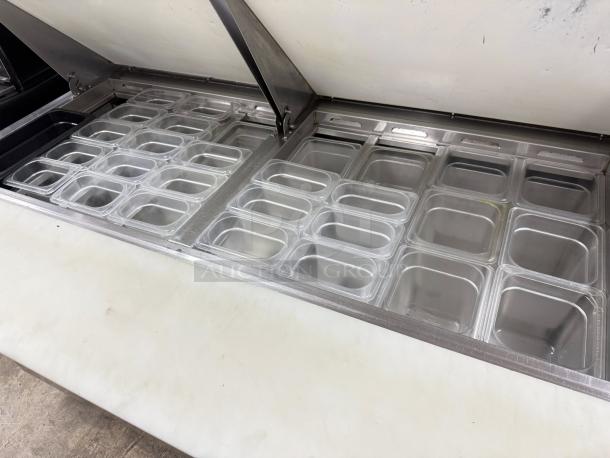 Everest EPBWR2 Mega Top Sandwich/Salad Prep Table with polycarbonate food pans, stainless steel interior, tested and working.