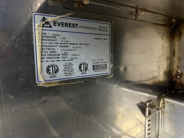 Everest Refrigeration EPBWR2 label showing compressor details, refrigerant type R-134a, and electrical specifications.