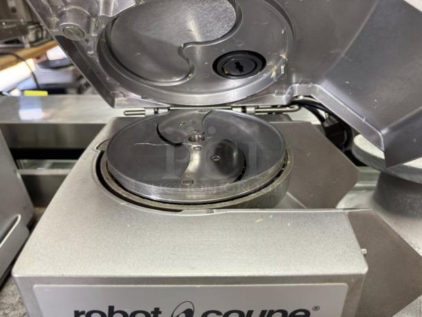 Robot Coupe CL 50 Series E vegetable preparation machine, shown with open lid. Tested and working condition. 115v.