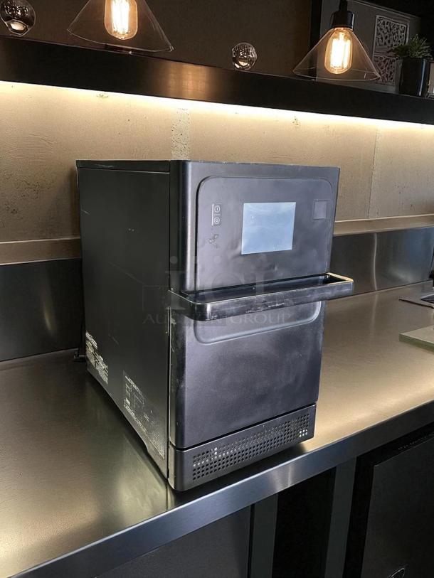 Merrychef Eikon e2s high-speed countertop oven, ventless, 208/240V, black finish, excellent condition, tested and working.