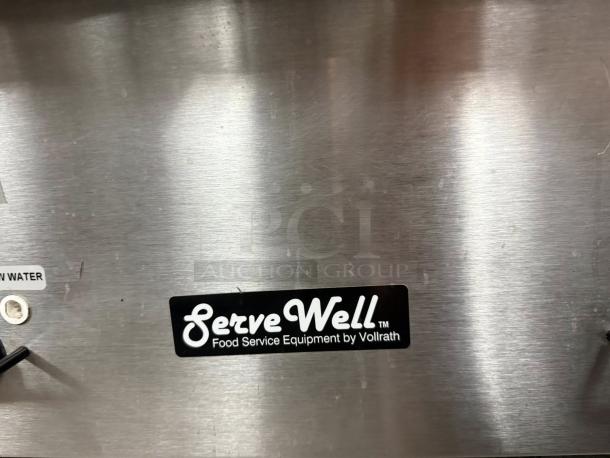 Vollrath 38203 ServeWell Electric Hot Food Table, three pan capacity, stainless steel, ServeWell label visible.