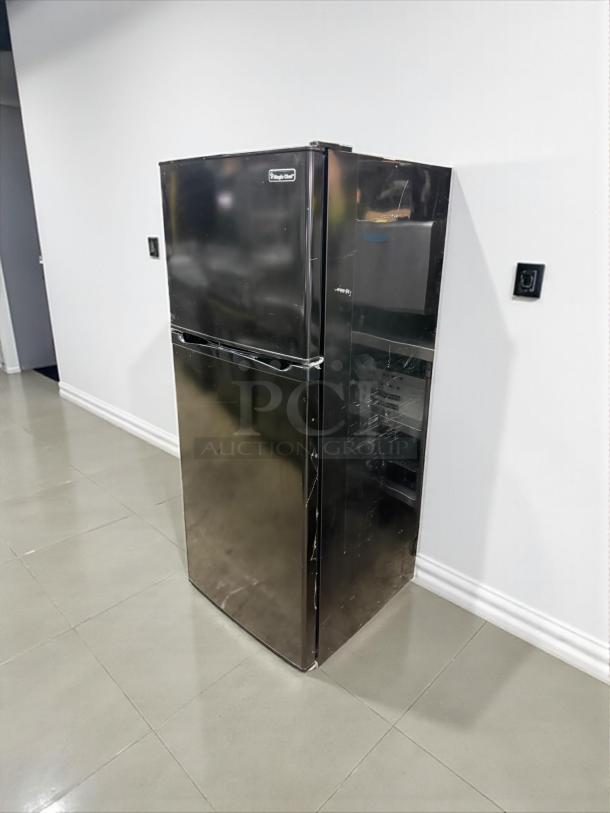 Magic Chef 7.3 cu. ft. 2-door black mini fridge with freezer. Good condition, tested and working, 115v.